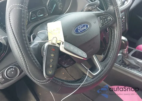 2017 Ford Escape Titanium z USA, uszkodzony, nr VIN 1FMCU9JD5HUD86258